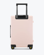 women carry on spinner luggage